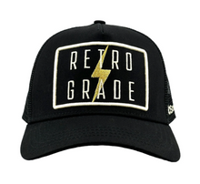 Load image into Gallery viewer, Soulbyrd Black Gold Retrograde Trucker Hat
